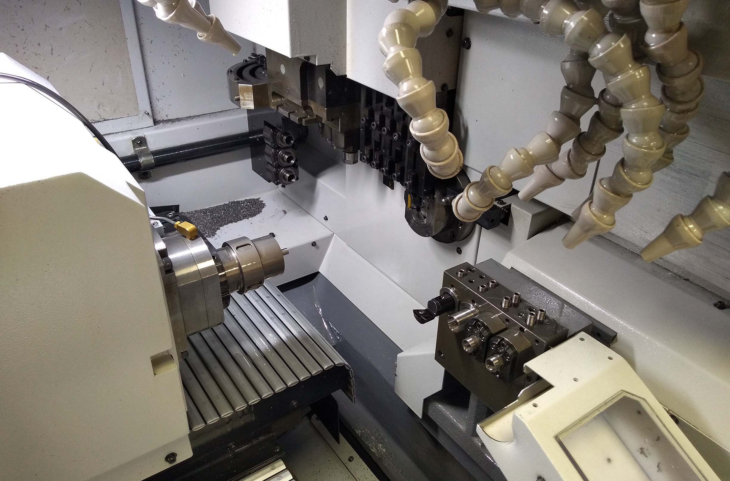 CNC sliding head lathe